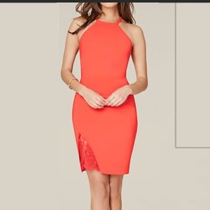 Bebe orange dress with thigh slit and lace reveal